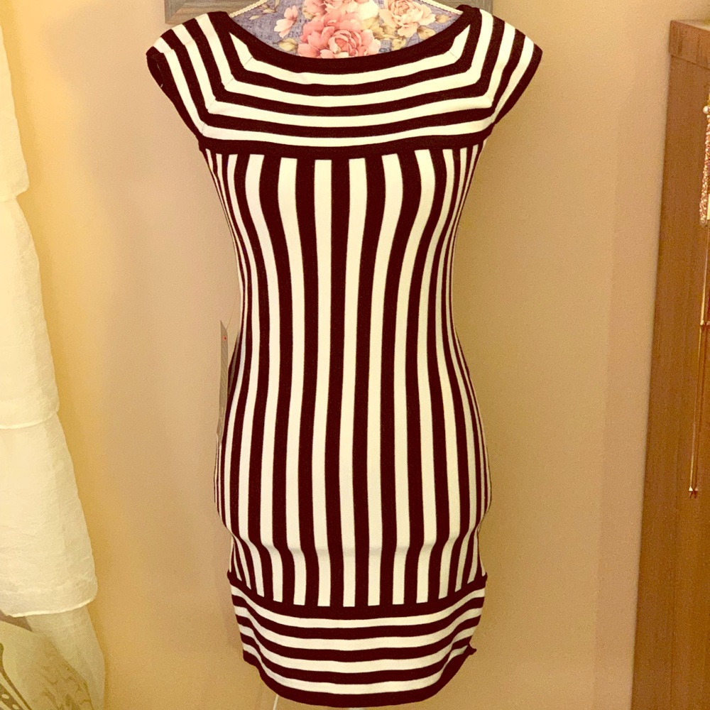 BEBE NWT Black & white striped stretchy mini dress